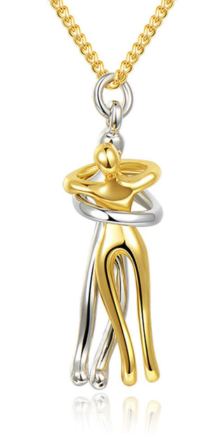 Elegant gold and silver pendant necklace showcasing a unique abstract figure design with a minimalist, contemporary style. Ideal accessory for elegant women's fashion.
