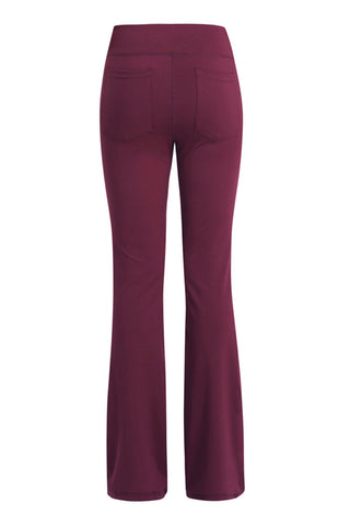 Stylish burgundy flared yoga pants with high waistline and figure-flattering design.