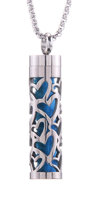Elegant Aromatherapy Pendant: Stainless Steel Necklace with Carved Heart Design in Teal and Silver Tones