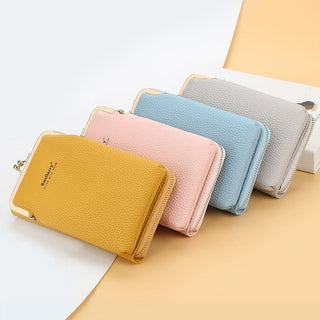 Colorful fashion mobile phone shoulder bags with lock. Women's messenger bag wallets in various pastel shades displayed on minimalist background.