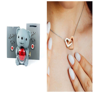 Elegant rotating heart-shaped eternal flower necklace in gift packaging box