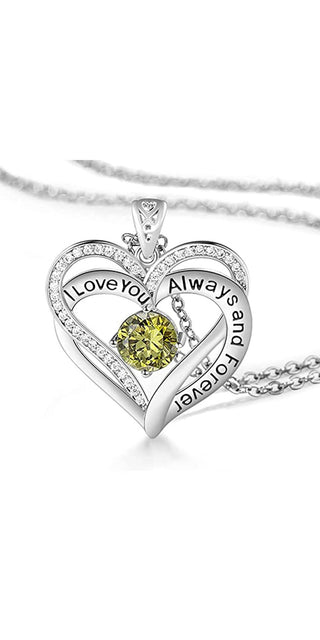 Elegant heart-shaped necklace with sparkling crystal embellishments and a captivating yellow gemstone center. Thoughtful jewelry piece for the fashionable woman.