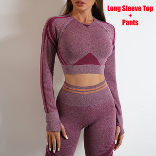 Fitted purple seamless workout set: long sleeve top and legging pants. Stylish athletic wear for active lifestyle.