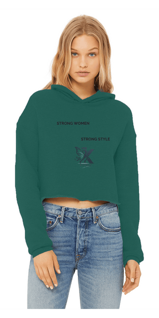 Stylish cropped green hoodie with graphic design, worn by a young woman against a plain background.