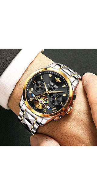 Luxury automatic men's watch with gold and silver accents showcased on a hand.