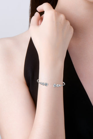 Elegant diamond cuff bracelet - 18K gold plated sparkling cubic zirconia bangle on woman's arm