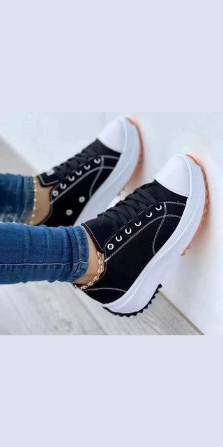Stylish Fashion Star Orthopedic Sneakers - Trendy black canvas shoes with white soles, ideal for comfortable everyday wear.