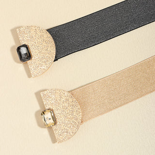 Decorative waist belts with ornate buckles and textured bands