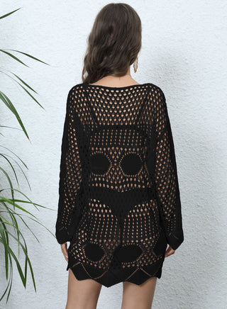 Stylish crochet cover-up with intricate lace pattern, ready for the beach or pool.
