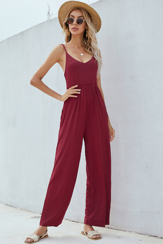 Chic Maroon Sleeveless Jumpsuit with Wide Legs and Sunglasses