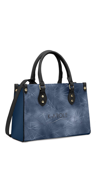 Exquisite suede and leather tote bag from K-AROLE with sleek geometric design for modern, stylish women's athleisure outfits.