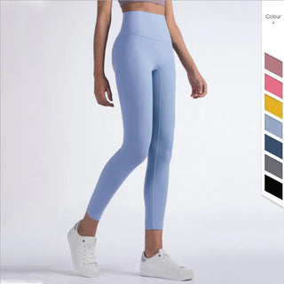 Stylish fitness leggings in a vibrant blue hue, featuring a sleek, form-fitting design and a high-waisted silhouette. The product is displayed on a plain background, showcasing the sleek, versatile nature of these trendy K-AROLE™️ activewear pieces.