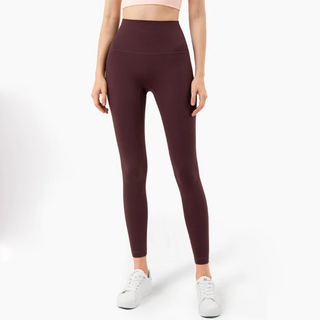 Burgundy high-waisted women's fitness leggings with a comfortable, stretchy material displayed on a white background.