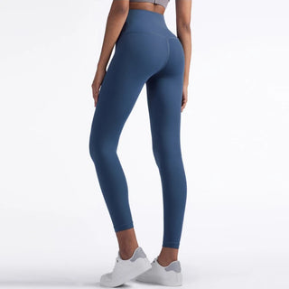Stylish fitness leggings in a vibrant blue hue, featuring a high-waisted design for a flattering fit. The image showcases the sleek, seamless construction and stretchy, comfortable material, perfect for an active lifestyle.