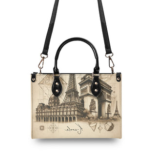 Elegant Parisian Tote - A fashionable handbag featuring a vintage-inspired illustration of the Eiffel Tower and Arc de Triomphe, perfect for adding a touch of French flair to any women's athleisure outfit from the K-AROLE™️ collection.