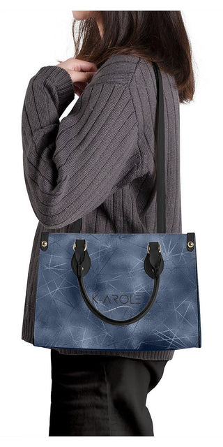 Experience Unparalleled Elegance with Our Blue Handbag Tote