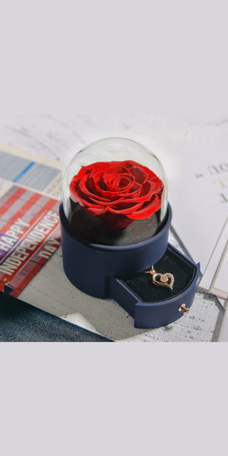Elegant rose jewelry box: Vibrant red rose displayed in a sleek, modern box for a thoughtful gift.