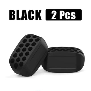 Pair of black silicone jaw exerciser facial toners and jawline fitness balls, neck toning equipment, and facial beauty tools for double chin exercise.
