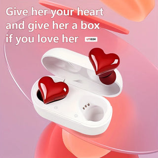 Heart-shaped wireless Bluetooth earphones in a gift box - stylish audio accessory for the music lover