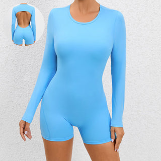 Sleek blue backless long sleeve yoga jumpsuit with open back design, showcased in the product image