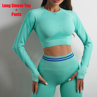 Mint green seamless long sleeve top and pants set with ribbed texture and contrasting stripes, showcasing a modern athleisure style.