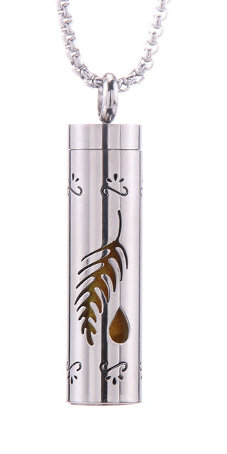 Elegant stainless steel aromatherapy pendant necklace with intricate leaf design, perfect for modern women's style.