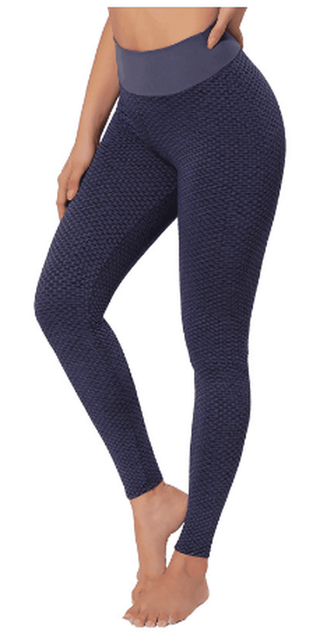 Stylish navy blue seamless leggings with textured pattern, designed for comfortable fitness and yoga workouts.
