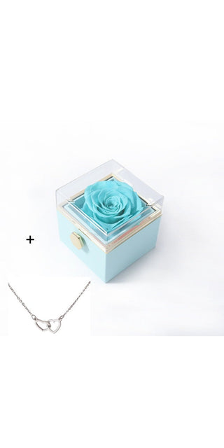 Elegant acrylic ring box with preserved blue rose, perfect for romantic proposal