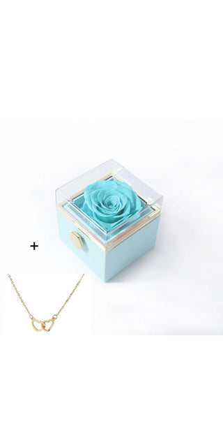 Elegant acrylic ring box with a captivating turquoise rose, perfect for a romantic Valentine's Day proposal.