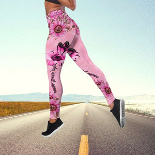 Vibrant floral print yoga pants with butterfly motif on open road