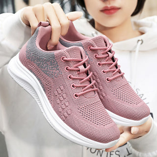 Lightweight, breathable women's sneakers in a stylish pink knit design. The sneakers feature a sleek, low-profile silhouette with a lace-up closure for a secure and comfortable fit. Suitable for casual or athletic wear, these sneakers offer a modern and versatile footwear option.