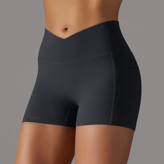 Black athletic shorts with side phone pocket for secure storage during workouts.