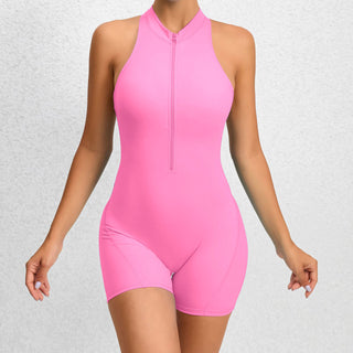 Sleek and stylish pink athletic jumpsuit with zipper front and stretchy form-fitting design for optimal performance and comfort during fitness activities.