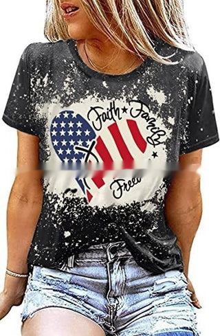 Vibrant graphic print women's casual t-shirt with American flag design and distressed details, showcasing trendy fashion style.