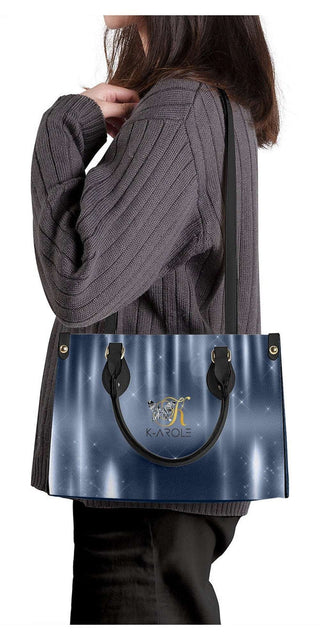 Elegant blue handbag: K-AROLE's stylish tote featuring a starry night-inspired design, perfect for elevating your fashionable athleisure outfits.