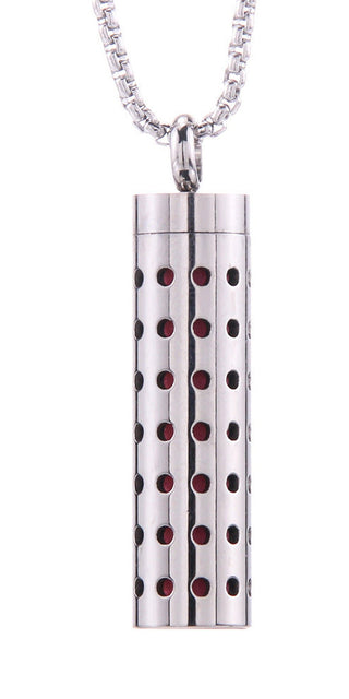 Elegant cylindrical pendant with polka dot design on stainless steel necklace. Trendy aromatherapy diffuser jewelry piece from the Ai-Shang Bags Store collection. Perfect accessory to enhance any K-AROLE women's athleisure outfit.