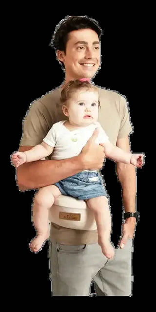 Smiling father holding baby in versatile waist stool carrier