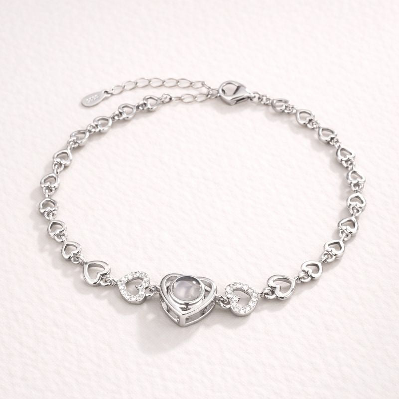 Luxury silver heart projection bracelet with hidden photo projection – personalized jewelry by K-AROLE