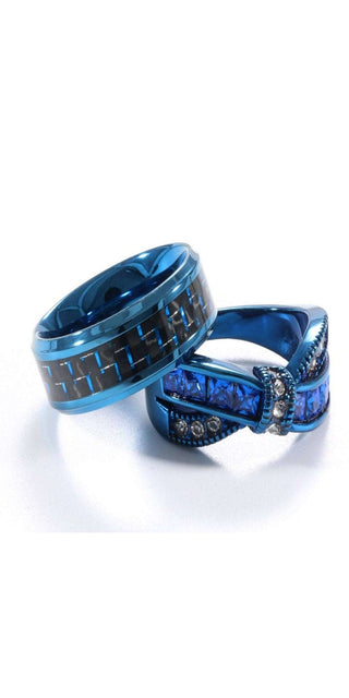 Sleek blue and silver couple rings with striking geometric patterns, showcasing elegant style and sophisticated design for a stylish fashion statement.