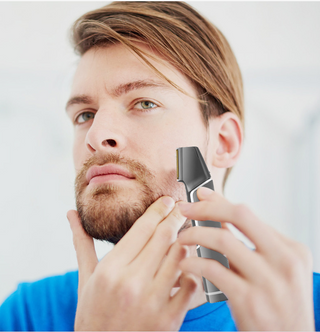 Sleek USB-powered men's grooming trimmer with smooth shave for facial hair and body. Compact, portable design for convenient at-home or on-the-go use.