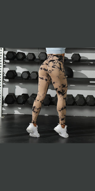 Fashionable tie-dye printed leggings with high waist, hip lifting design, ideal for fitness, sports, and yoga activities.