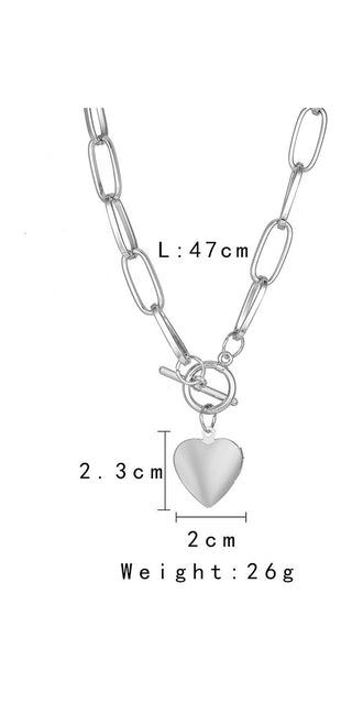Stylish metal heart-shaped photo box necklace from K-AROLE's jewelry collection. Elegant chain design with a personalized pendant for the modern woman's fashion.