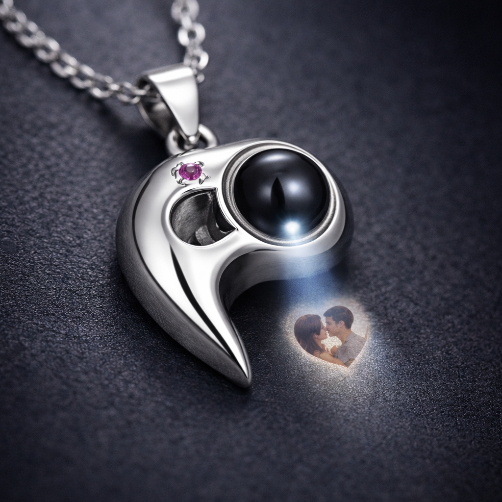 Close-up of heart projection necklace showing photo projection detail, realistic macro jewelry photography