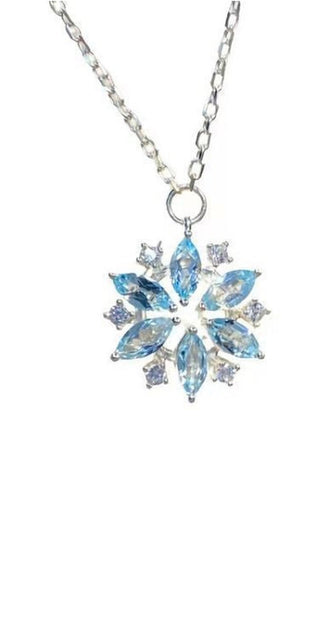 Elegant Sky Blue Snowflake Pendant: Dazzling sterling silver necklace with a mesmerizing rhinestone-encrusted snowflake charm, exuding winter wonder and sophisticated style.