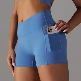Stylish blue yoga shorts with phone pocket design for active women's fitness attire