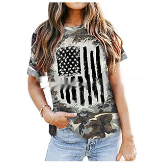Women's stylish camouflage-print t-shirt with American flag graphic on grey background