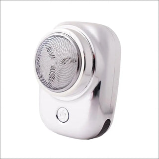 Compact electric shaver with chrome accents and rotating blade for precise short beard trimming.