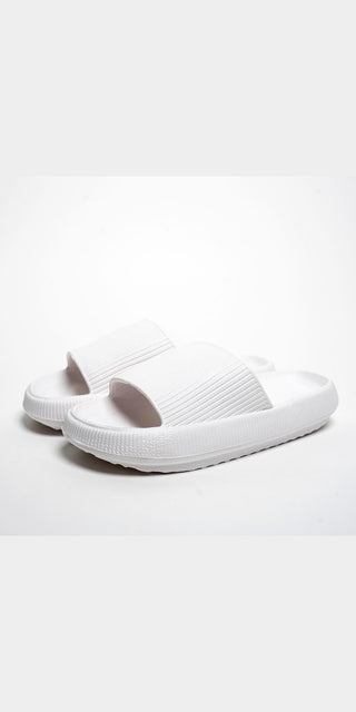 Experience timeless elegance with K-AROLE™ white slippers. The pristine white color exudes sophistication and versatility, making these slippers a perfect companion for any occasion. Slip into pure comfort and style with K-AROLE™."