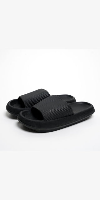 Experience timeless elegance with K-AROLE™ black slippers. These sleek and versatile slippers combine style and comfort, making them the perfect companion for any occasion