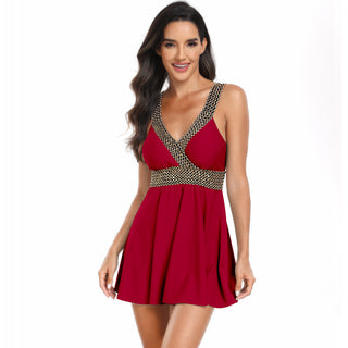 Stylish red swimsuit dress with polka dot accents, ideal for summer beach vacations.